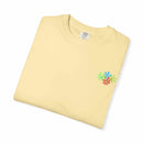 Island Tropical T-shirt folded with floral design, soft garment-dyed fabric.